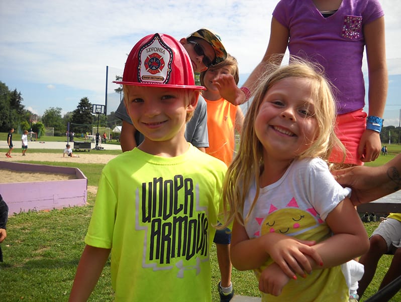 vacation week two happy campers at summer day camp